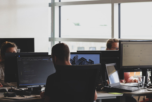 People in office working on computers